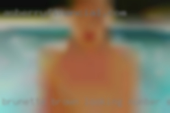Brunette, brown looking number eyes, D chest.